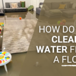 How do you clean up water from a flood?
